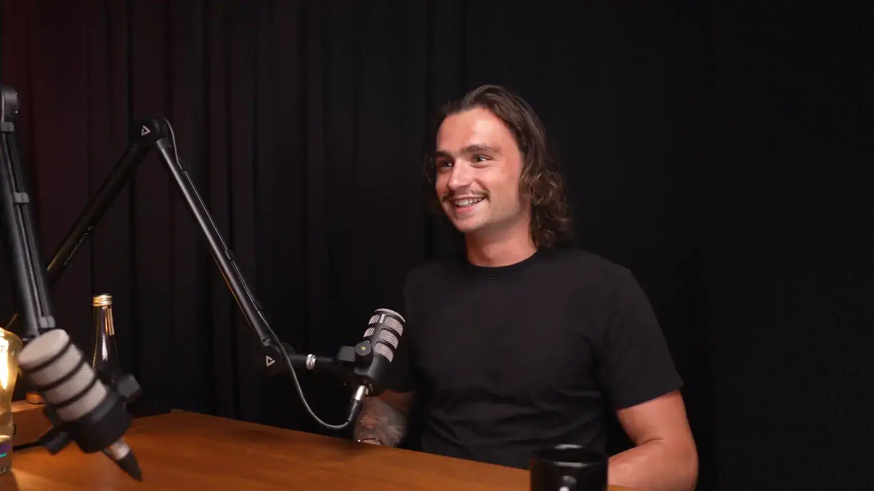 High-quality podcast studio with professional microphones and soundproofing in Villo Studio.
